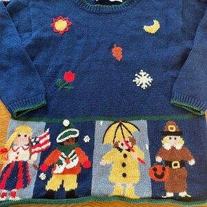Vintage novelty kids sweater with embroidered seasonal motifs